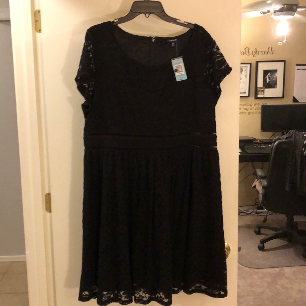 Black scoop neck skater dress.  Never worn.